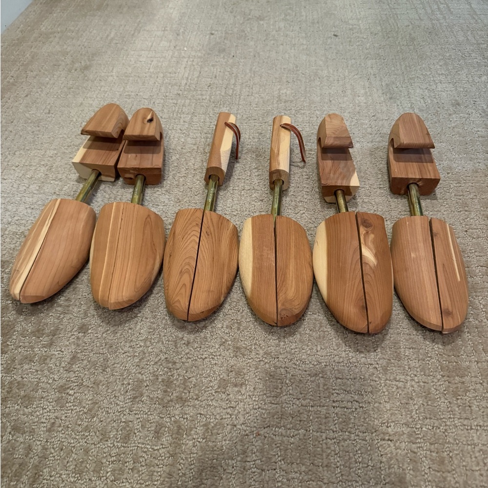 Three sets of cedar shoe trees